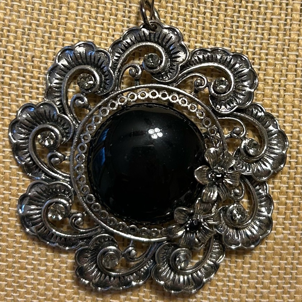 Elegant Silver-tone and Black Floral Pendant